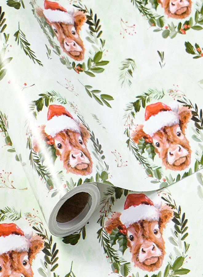 LeZakaa Christmas Highland Cow Wrapping Paper Roll, Cute Highland Cow with Santa Hat Green Wreath Design, Funny Holiday Gift Wrap for Farmhouse Style, Mini Roll 17 in x 16.4 Ft - Image 1